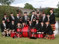 Sierra Highlanders Pipe Band in front of Stirling Bridge in Stirling, Scotland - August 2005